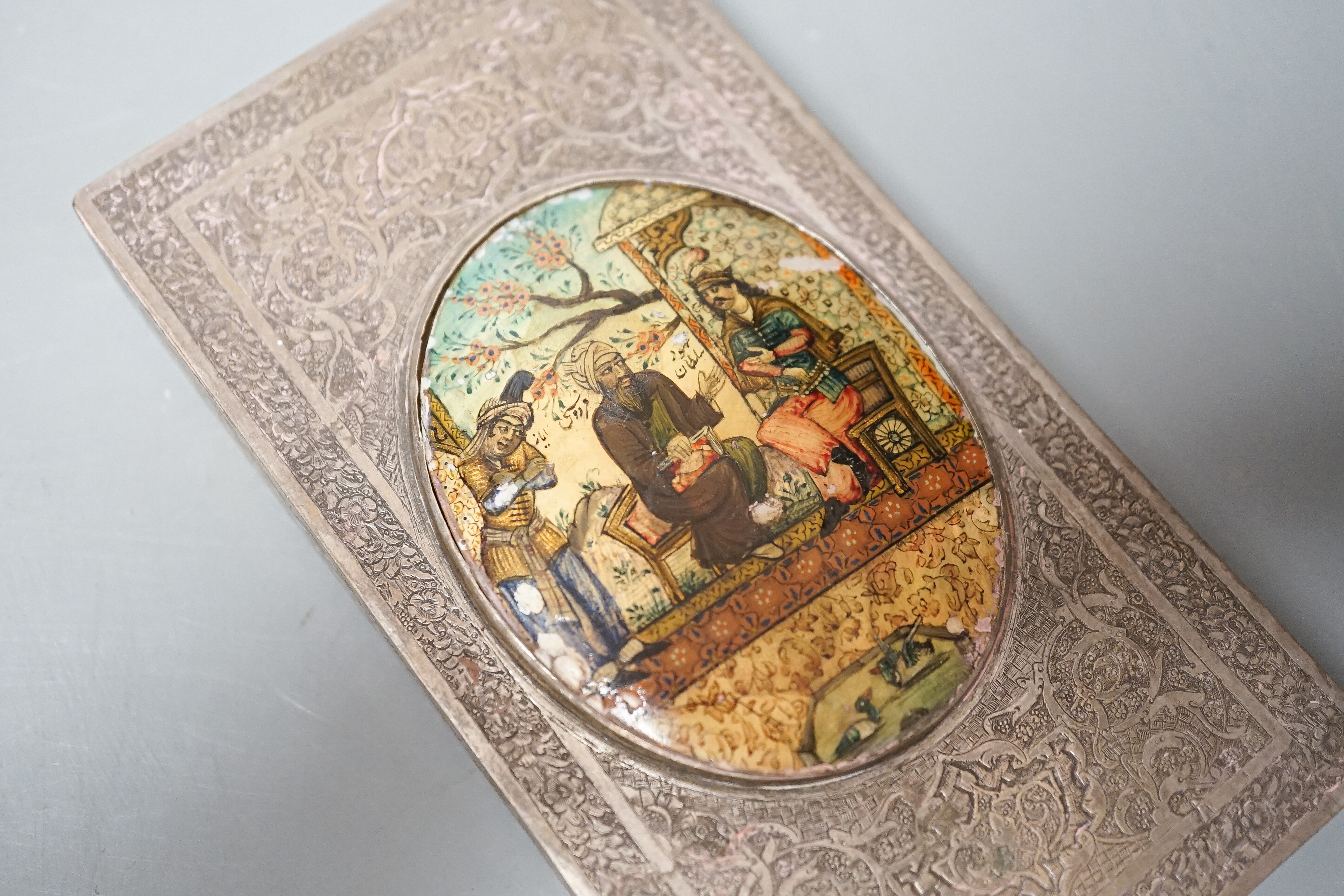 A Persian white metal box with inset miniature lid, 13.8cm.